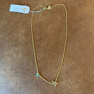 Gorjana gold necklace with stars.